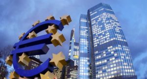 The Euro sculpture stands in front of the European Central Bank, right,  in Frankfurt, Germany, on Friday, Dec.16, 2011.(AP Photo/Michael Probst)